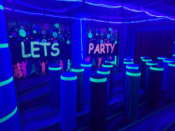 457846793 10233907714180560 685523731096592171 n 1734366253 GLOW Party Bouncer 20ft